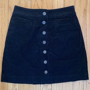Cute black corduroy mini skirt. Wilfred size 0.